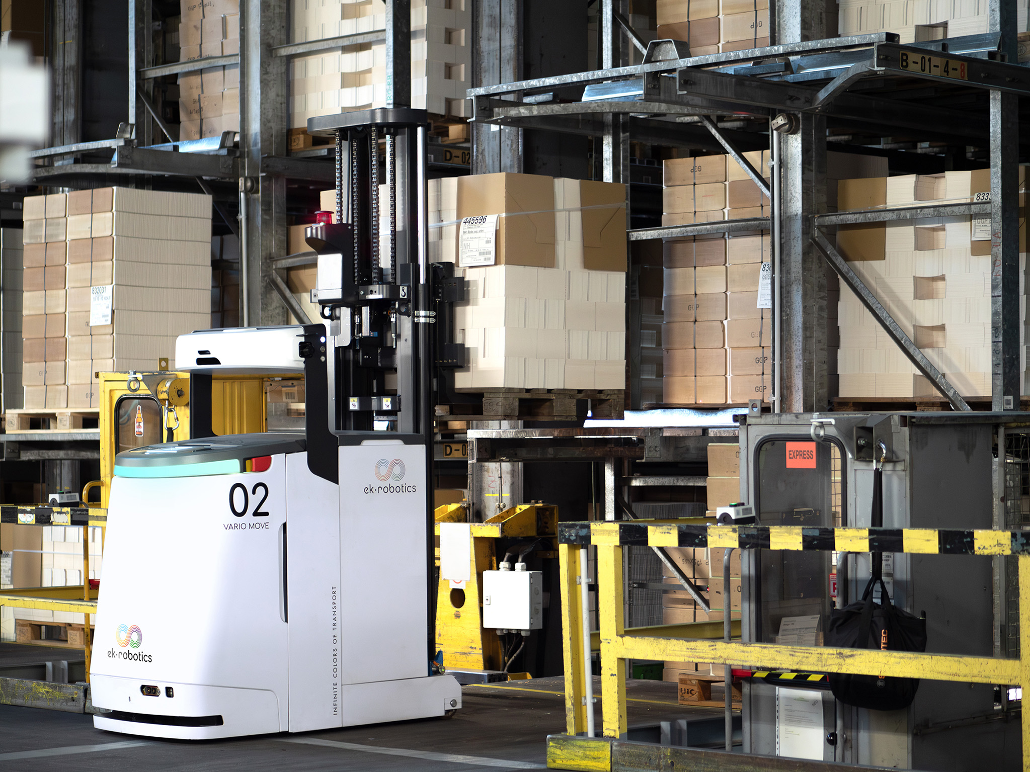 AGVs for Supply and Disposal of Printing Machines